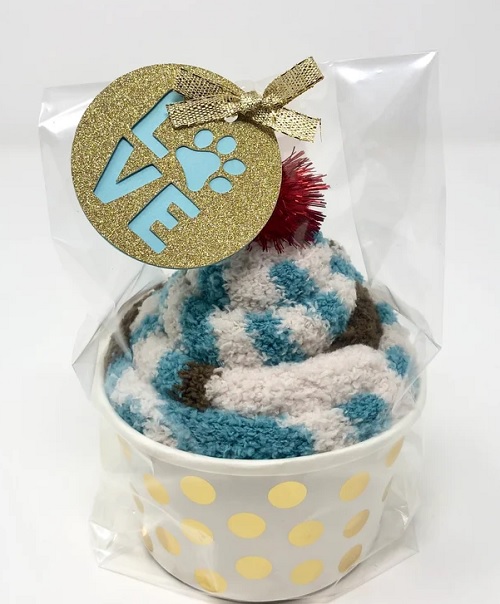 Dog Mom Gift - This whimsical gift looks like a cupcake but it's really a colorful pair of socks. 