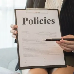 Picture of the clipboard with the word Policies on top