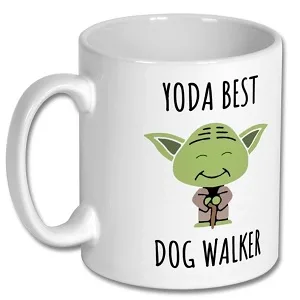 Coffee mug in cream with "Yoda Best Dog Walker" and a picture of Yoda. 