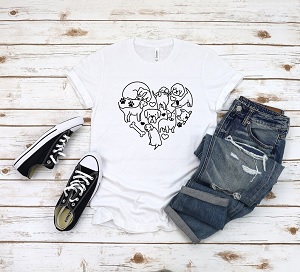 Gifts for Dog Walkers - White t-shirt with black drawing of dogs and bones in the shape of a heart. 