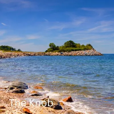 Title "The Knob" Picture of a inlet with rocks