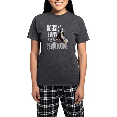 Picture of a womens body wearing a dark gray t-shirt with the words "The Best Therapy is Bernedoodle"