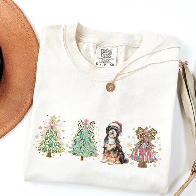 Christmas Tree Bernedoodle Shirt - Design includes three Christmas Trees and a Bernedoodle decorated in lights in a row. 