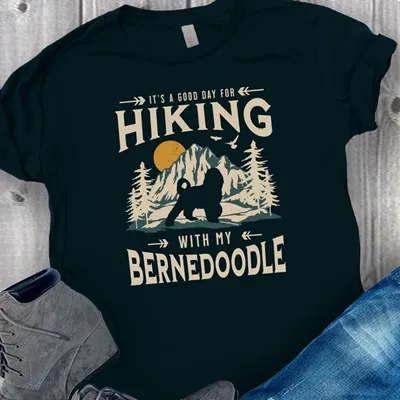 Hiking With My Bernedoodle - black t-shirt with a mountain scene and a black silhouette of a Bernedoodle