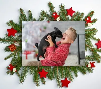 Happyoodles.com - The Christmas Puppy - Boy and dog on Christmas Background