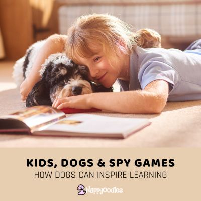 Dogs, Kids and Spy Games- How Dogs Can Inspire Learning - with young girl and dog with book